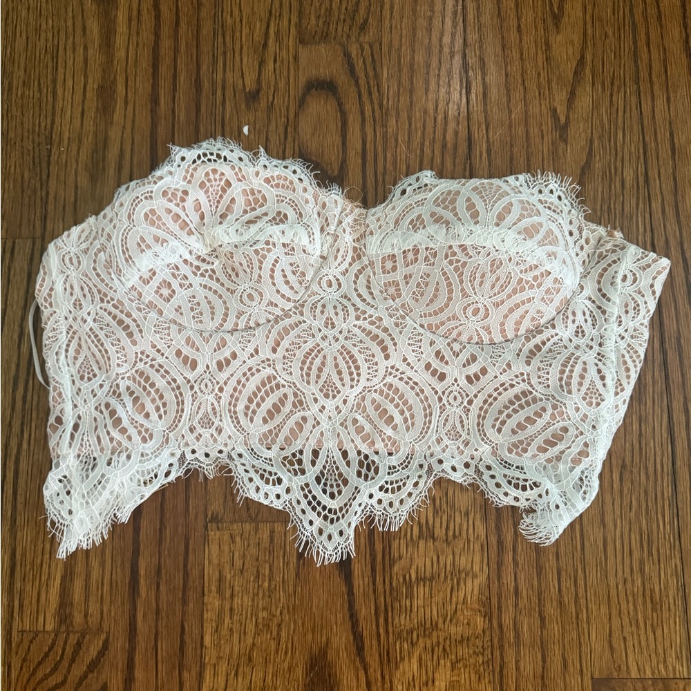 Zip up lace in the back size 2 bustier with cups!